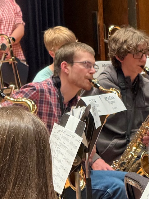 All state band student playing tenor saxophone.