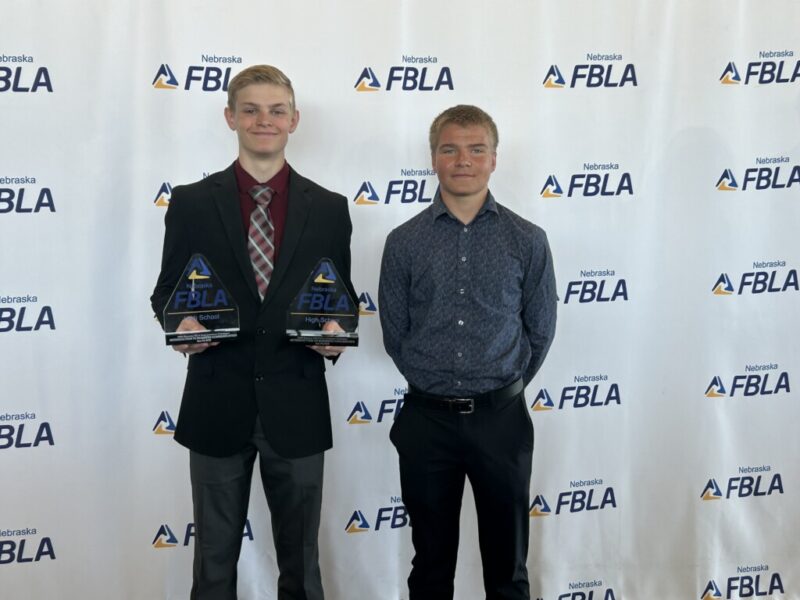 Students holding FBLA Awards.