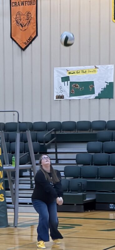 Dr. Coffey playing volleyball