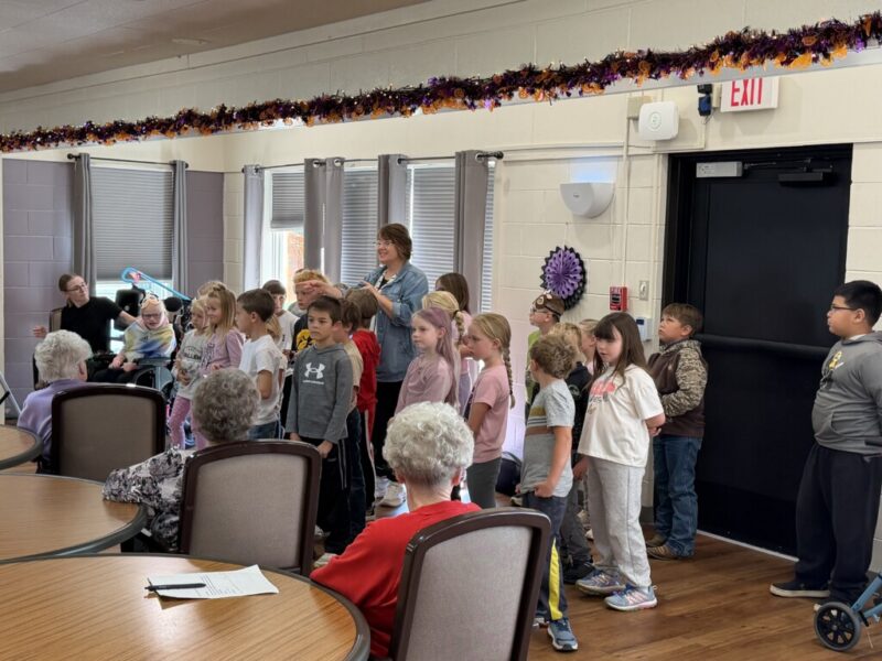 1st and 2nd grade performing at Pioneer Manor