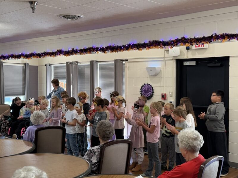 1st and 2nd grade performing at Pioneer Manor