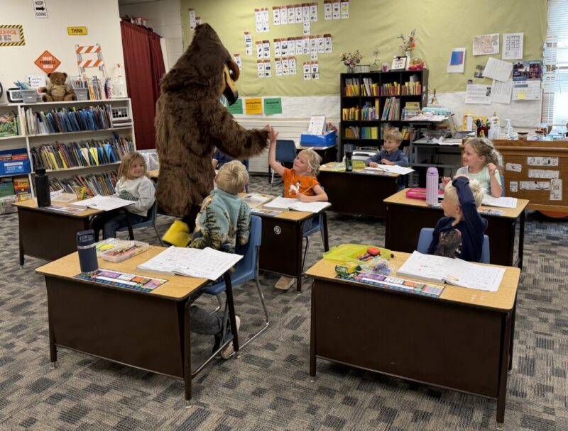 New Hawk mascot gives student a high-five